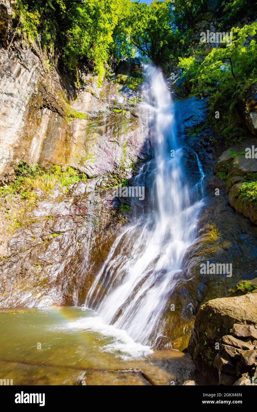 Beautiful Makhuntseti rainbow waterfall view in Georgia local attraction at summer day Stock Photo