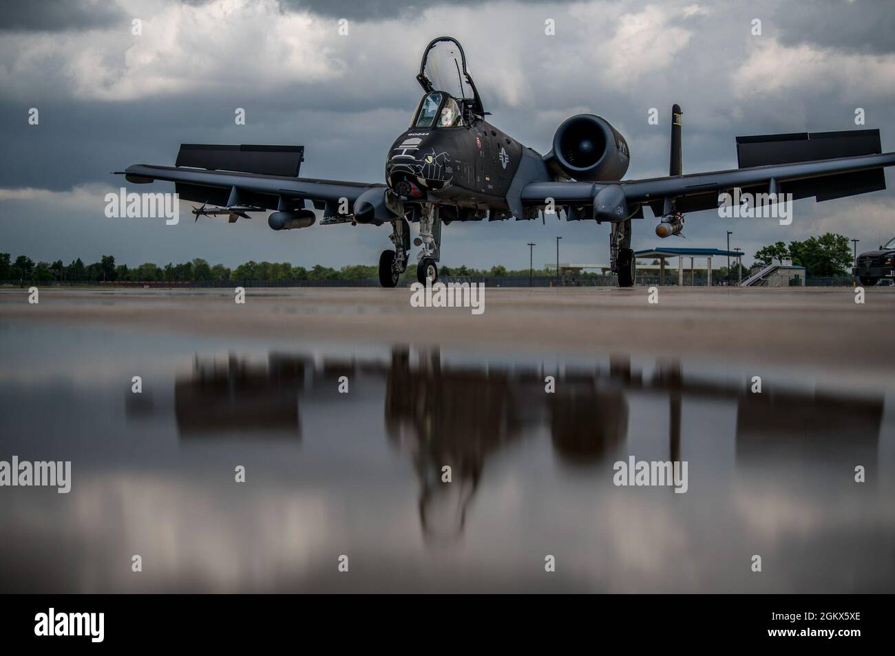 An A-10C Thunderbolt II aircraft with the 122nd Fighter Wing, Fort Wayne, Indiana, taxis on the flight line, July 15, 2021, at the 122nd Fighter Wing, Fort Wayne, Indiana. The new black paint scheme commemorates 100 years of aviation in the Indiana National Guard. Stock Photo