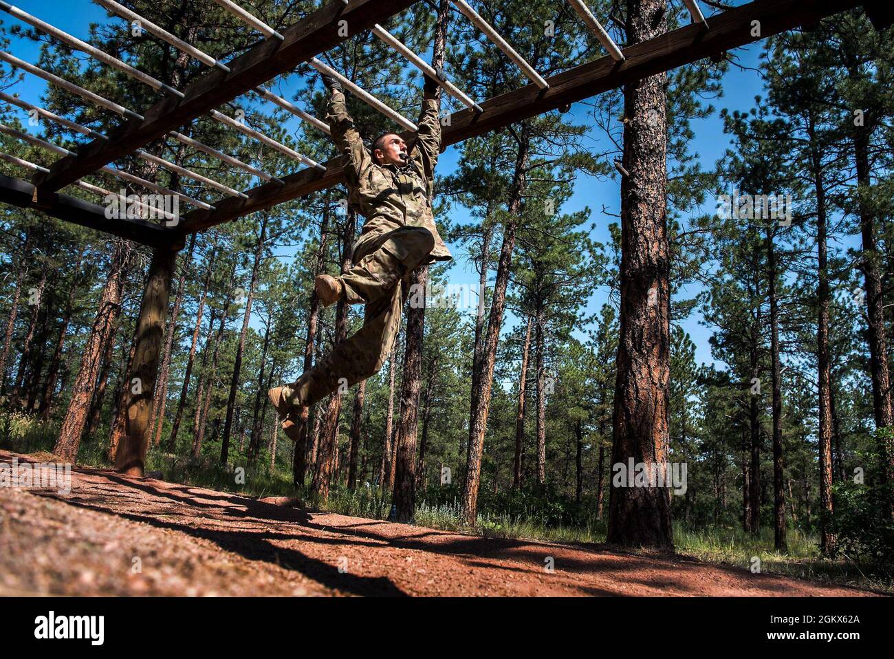U.S. AIR FORCE ACADEMY, Colo. – A basic cadet from the Class of 2025 completes the obstacle course at the U.S. Air Force Academy's Jacks Valley in Colorado Springs, Colo., on July 15, 2021. Basic Cadet Training (BCT) is a six-week indoctrination program to guide the transformation of new cadets from being civilians to military academy cadets prepared to enter a four-year officer commissioning program. Stock Photo