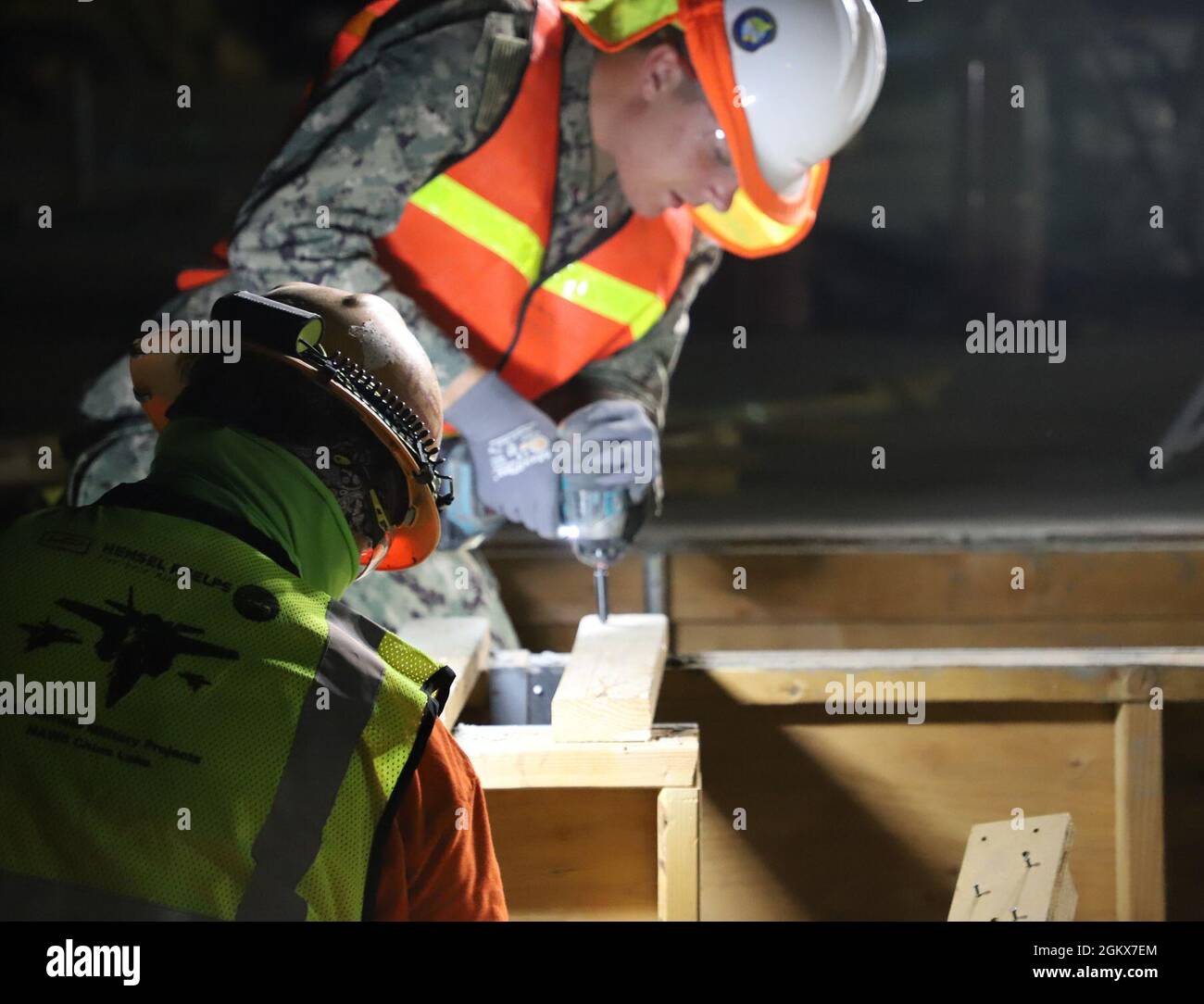 Seabee from Naval Mobile Construction Battalion FOUR (NMCB 4) building