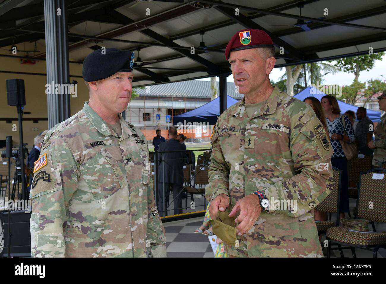 Maj. Gen. Andrew M. Rohling, U.S. Army Southern European Task Force, Africa commander, right, speaks with on Col. Daniel J. Vogel, outgoing commander of U.S. Army Garrison Italy, left, during change of command ceremony under Covid-19 prevention condition at Caserma Ederle, Vicenza, Italy July 16, 2021. Stock Photo