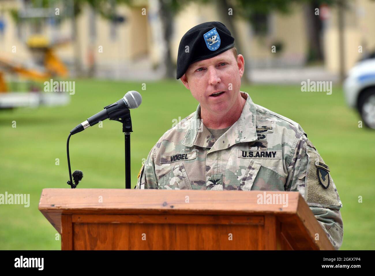 U.S. Army Col. Daniel J. Vogel, outgoing commander of U.S. Army Garrison Italy, gives a speech during change of command ceremony under Covid-19 prevention condition at Caserma Ederle, Vicenza, Italy July 16, 2021. Stock Photo