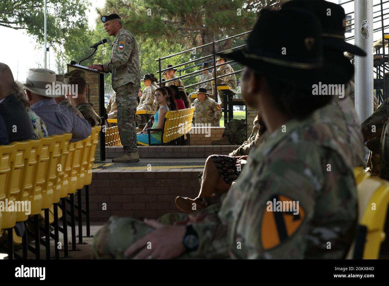 U.S. Army Forces Command Commanding General, Gen. Michael X. Garrett delivers remarks during Brig. Gen. Brett Sylvia, 1st Cavalry Division deputy commanding general-maneuver’s, farewell ceremony and Col. Steven Carpenter, 1st Cavalry Division deputy commanding officer-support’s, welcome 'patch' ceremony on Cooper Field, Fort Hood, TX, July 16, 2021. “I want to tell you how much the First Team means to our Nation’s defense, our military’s readiness and to the Soldiers, civilians, Families, veterans and citizens who believe in the 1st Cav’s Courageous, Audacious, and Victorious Soldiers,” Garret Stock Photo