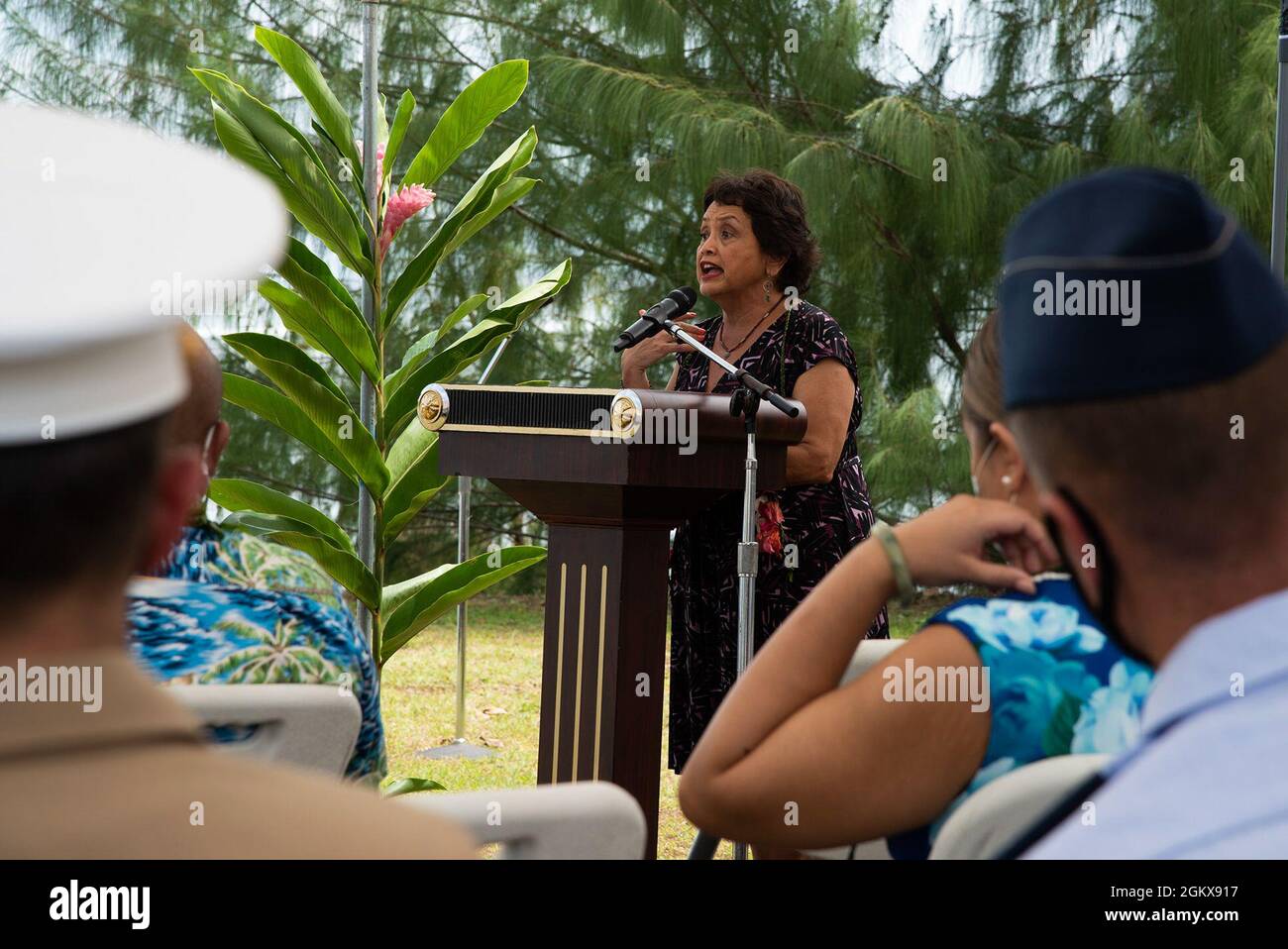 ASAN, Guam (July 19, 2021) - Governor of Guam Lourdes Leon Guerrero offers remarks during the Asan Beach Landing Memorial ceremony July 16. Military service members, local government officials and residents gathered to recall the U.S. military’s liberation of Guam during World War II. The site of the ceremony is where the 3rd Marine Division planted the U.S. flag after securing the beachhead. Approximately 55,000 Marines and Army soldiers participated in the battle for Guam. More than 1,800 American service members were killed in action or died of wounds during the first 21 days of combat. Stock Photo
