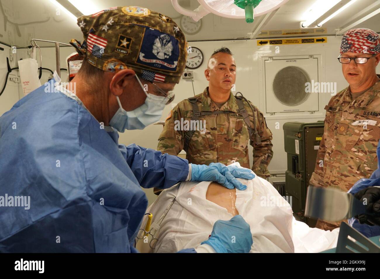 Lt. Col. Robert Steckler, a general surgeon with the 479th Medical Detachment, 399th Field , 803rd  Center performs a thoracotomy on a surgical cut  to inspect the chest cavity as part of a simulated exercise during Regional Medic at Fort McCoy, Wis., July 16, 2021. A cut  is a  comprised of simulated internal organs that can be used to mimic realistic traumatic events on a live casualty. The Army Reserve’s Combat Support Training Program (CSTP) exercises prepare U.S. Army Reserve units to be combat-ready by immersing them in realistic scenarios where they train as they would fight. Stock Photo