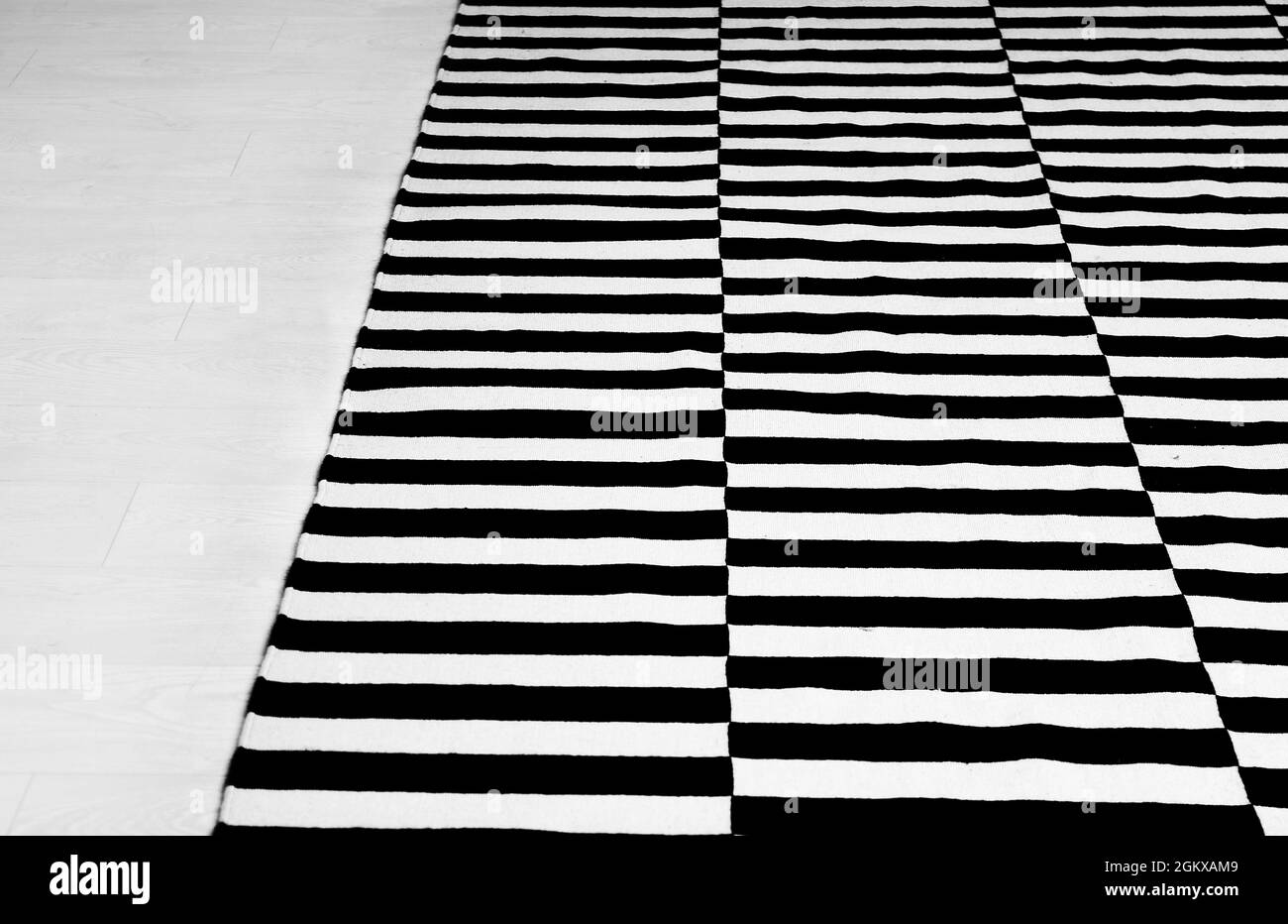 Black and white striped carpet on floor, closeup Stock Photo Alamy