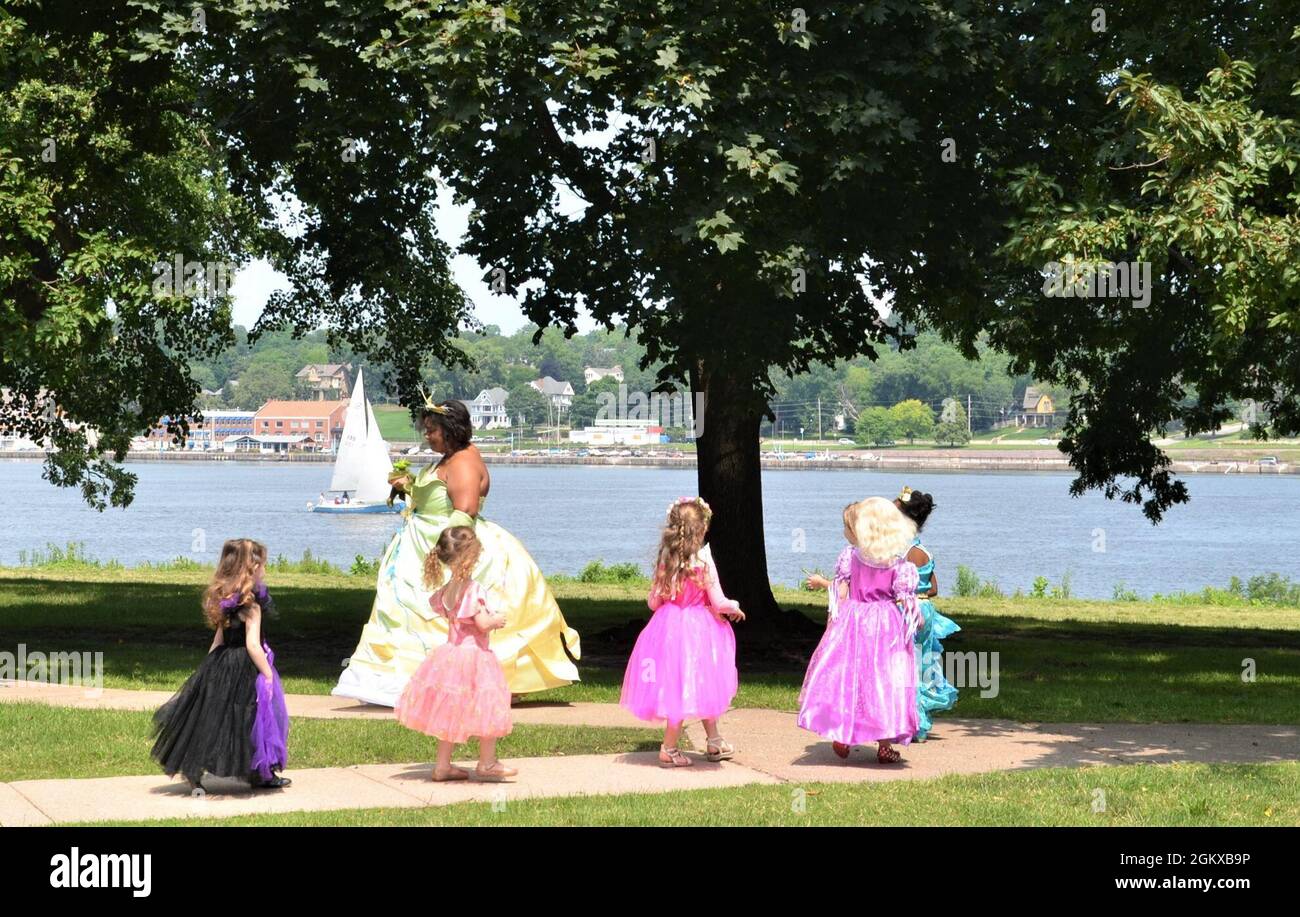 Princess Tiana leads the princess parade along the Mississippi River during the “Storytime with Princesses” event held at Rock Island Arsenal, Illinois, July 17. Stock Photo