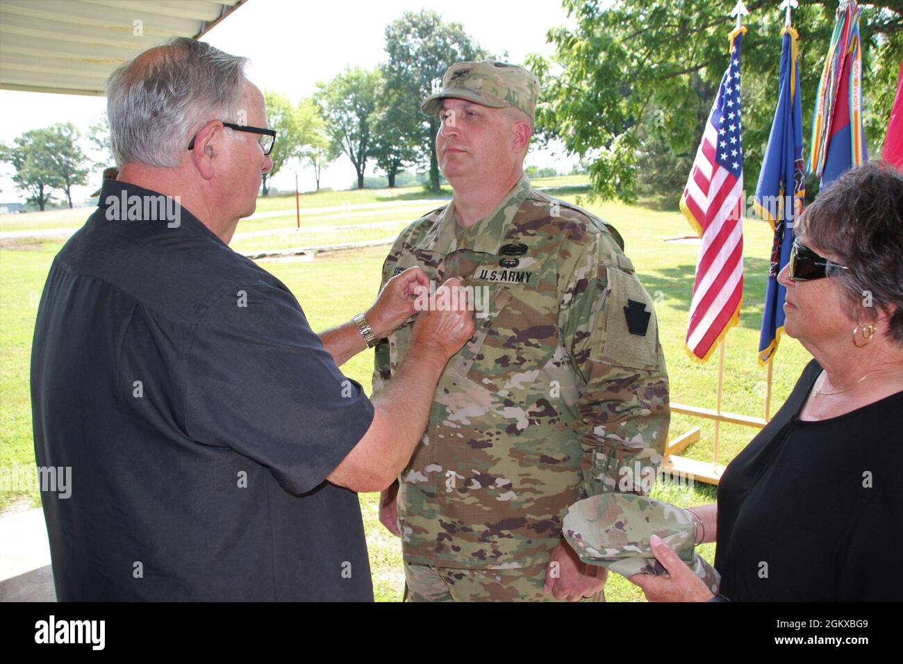 Col. Jeffery Heasely was promoted to the rank of Brigadier General by Maj. Gen. Mark D. McCormack at Fort Indiantown Gap July 17. Heasely started his military career over 30 years ago in the field artillery in Oil City, Pa. as a Private. He noted his family’s support was essential to his success. Here Heasley's Father Robert pins his star. Heasley will serve as the deputy commander to the 28th Infantry Division. Stock Photo