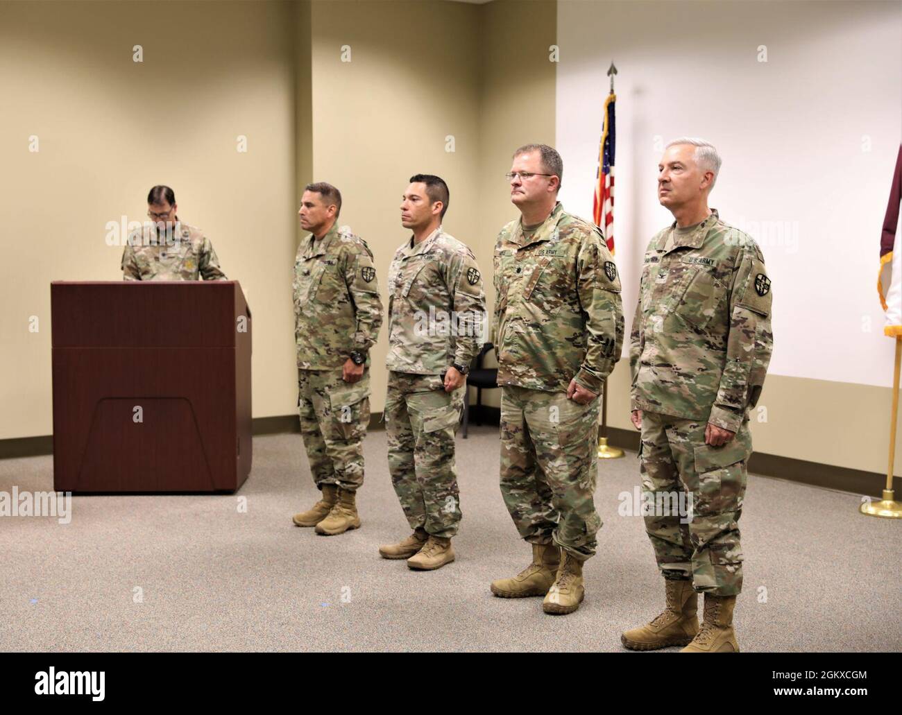 From right, Col. Gerald Hautman, Lt. Col. Michael Moyle, Sgt. 1st Class  Andrew Diaz of 7302nd Medical Training Support Battalion, and Col. Carlos  Tamez, 3rd Medical Training Brigade commander, stand in formation