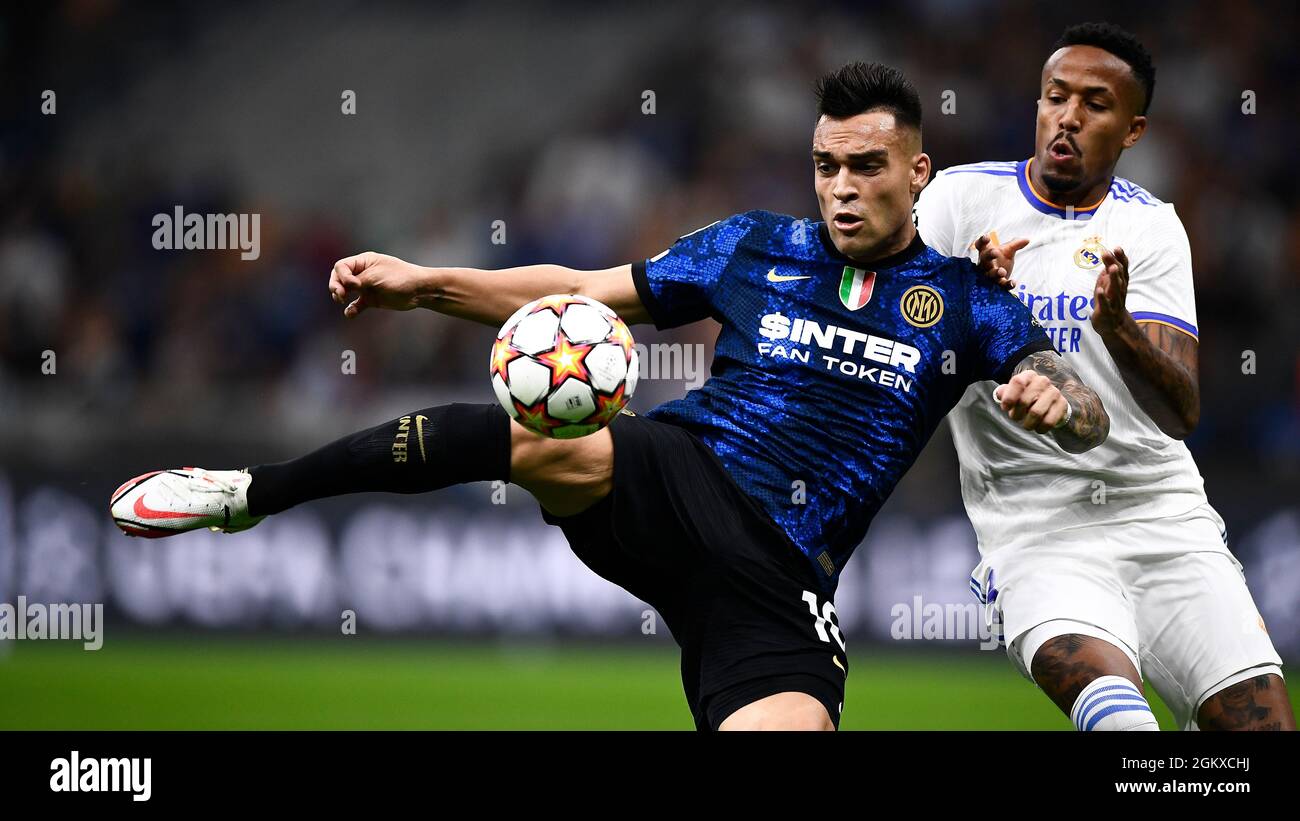 Milan, Italy. 15 September 2021. Lautaro Martinez (L) of FC Internazionale is challenged by Eder Militao of Real Madrid CF during the UEFA Champions League football match betweenFC Internazionale and Real Madrid CF. Credit: Nicolò Campo/Alamy Live News Stock Photo