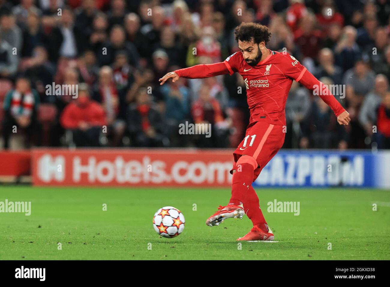 Mohamed Salah #11 of Liverpool misses his penalty asMike Maignan #16 of AC Milan saves it Stock Photo