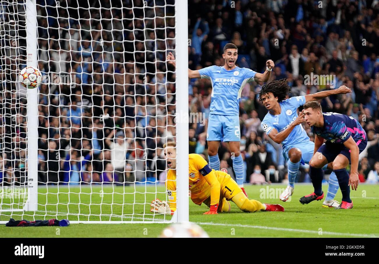 Manchester City's Nathan Ake (second right) scores their side's first goal of the game during the UEFA Champions League, Group A match at the Etihad Stadium, Manchester. Picture date: Wednesday September 15, 2021. Stock Photo