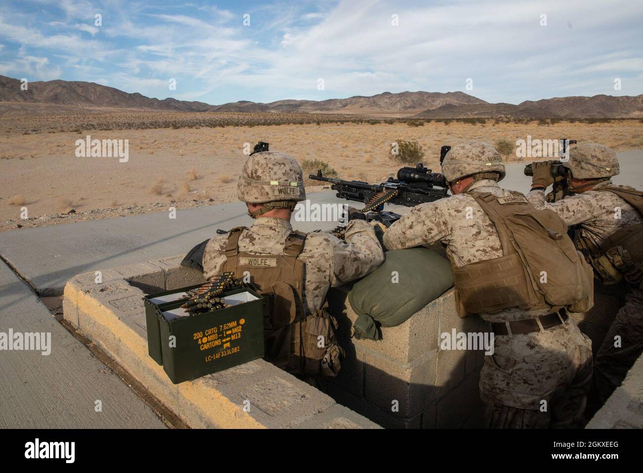 U.S. Marines with Co. K, 3rd Battalion, 7th Marine Regiment (3rd Bn., 7th Marines), 1st Marine Division, shoot an M240B machine gun during a squad defense range at Marine Corps Air Ground Combat Center Twentynine Palms, California, July 16, 2021. Marines with 3rd Bn., 7th Marines participated in various training exercises to compete for ‘best squad’ in preparation for Super Squad. Stock Photo