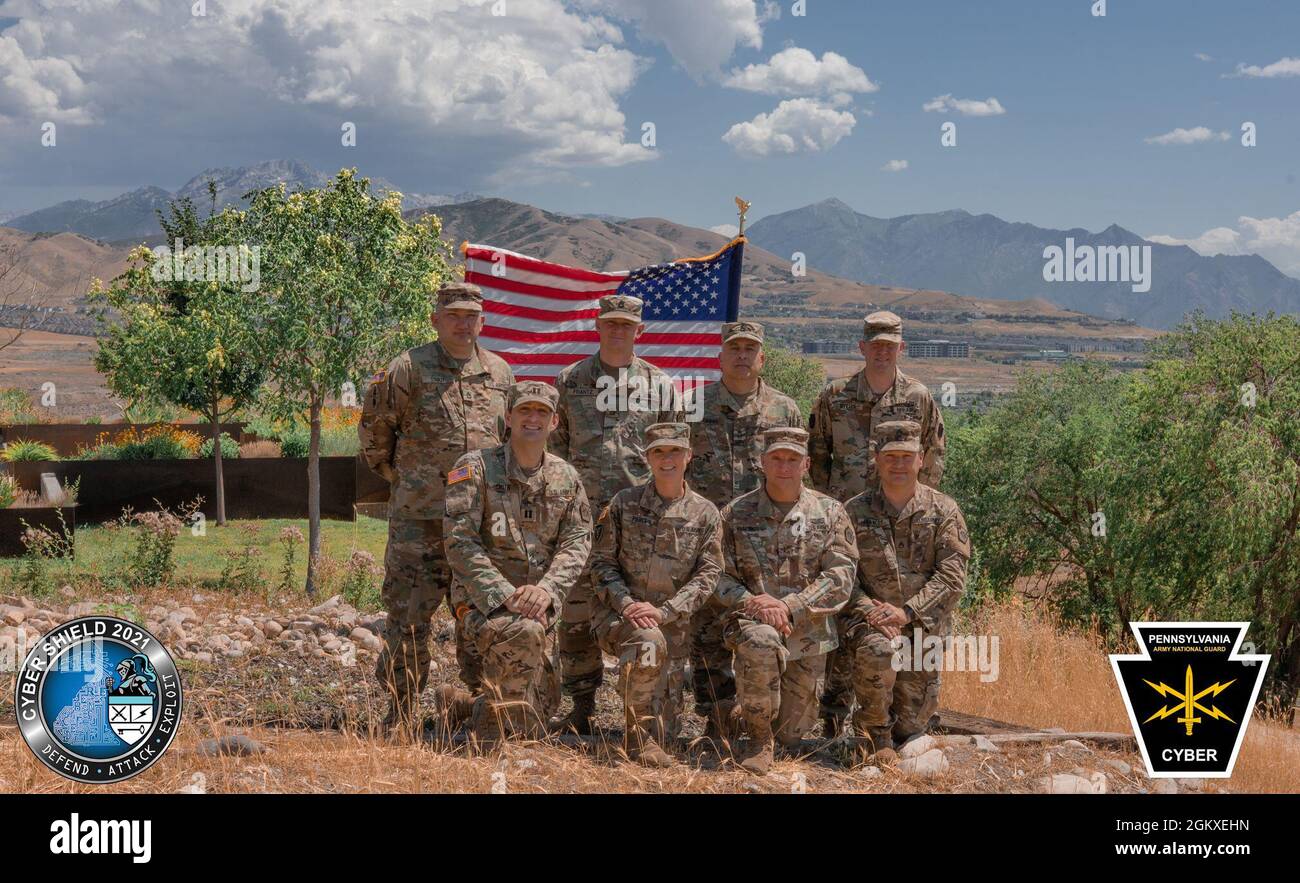 Eight cyber experts from the Pennsylvania National Guard are participating in Cyber Shield, the Department of Defense’s largest unclassified cyber defense exercise, from July 10-23 at Camp Williams, Utah.  Bottom row (from left to right): Capt. Sean Smith, Maj. Christine Pierce, Chief Warrant Officer 3 Jeremy Marroncelli, Staff Sgt. Andrew Clancey; Top row (from left to right): Sgt. 1st Class Keith Stout, Sgt. 1st Class Brian Frantz, Master Sgt. Elefterios Ginnis, Sgt. 1st Class Douglas Byers Stock Photo
