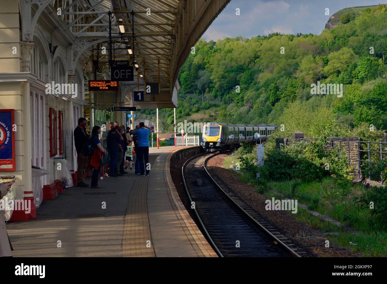 HALIFAX. WEST YORKSHIRE. ENGLAND. 05-29-21. The railway station. Northern Rail DMU 195120 approaches with the 17.17 train to Liverpool Lime Street. Stock Photo