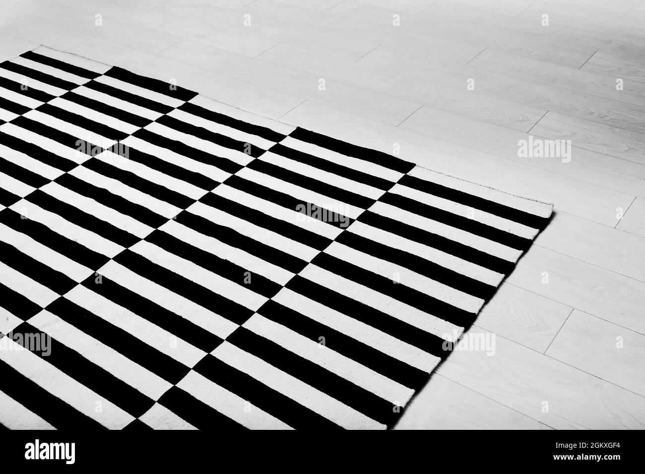 Black and white striped carpet on floor, closeup Stock Photo Alamy