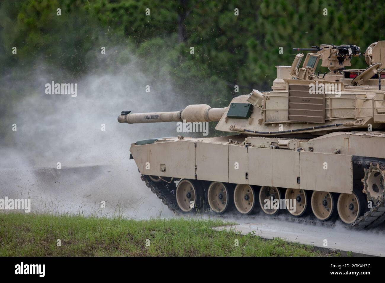 A U.S. Army M1A2 SEP V2 Abrams Tank, assigned to 3rd Squadron, 16th Calvary Regiment, fires the 120mm main gun at their assigned targets at Ware Range, Fort Benning, GA., July 20, 2021. These Tankers are training to become Mater Gunners, and be subject matter experts in their field. Stock Photo