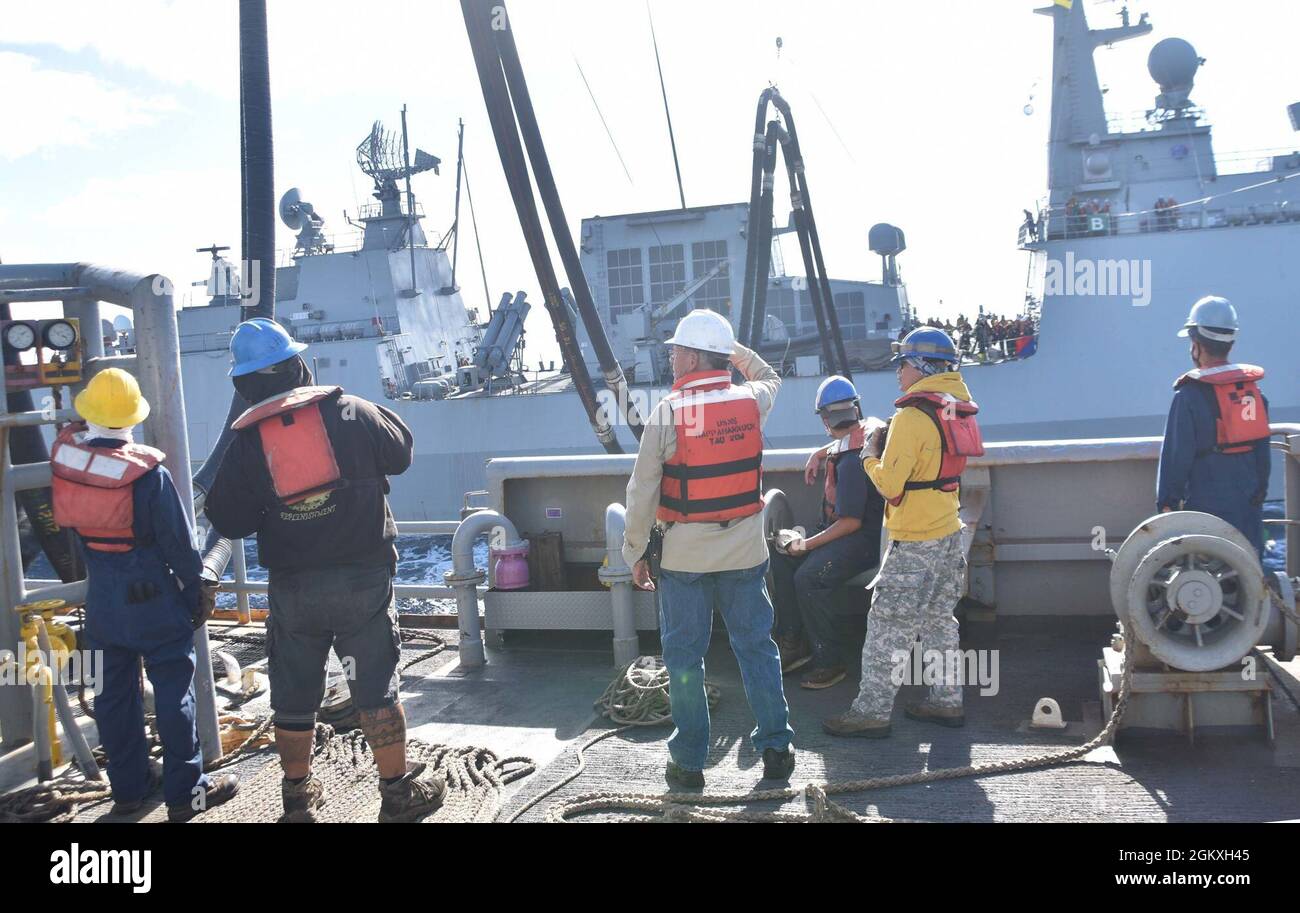 https://c8.alamy.com/comp/2GKXH45/usns-rappahannock-t-ao-204-crew-members-prepare-to-resupply-roks-wang-geon-ddh-978-a-republic-of-korea-navy-chungmugong-yi-sun-sin-class-destroyer-in-the-coral-sea-july-19-2021-as-part-of-talisman-sabre-21-this-is-the-ninth-iteration-of-talisman-sabre-a-large-scale-bilateral-military-exercise-between-australia-and-the-united-states-involving-more-than-17000-participants-from-seven-nations-the-month-long-multi-domain-exercise-consists-of-a-series-of-training-events-that-reinforce-the-strong-us-australian-alliance-and-demonstrate-the-us-militarys-unwavering-commitment-to-a-fre-2GKXH45.jpg