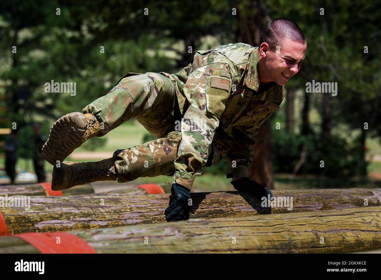 U.S. AIR FORCE ACADEMY, Colo. – A basic cadet from the Class of 2025 completes the confidence course at the U.S. Air Force Academy's Jacks Valley in Colorado Springs, Colo., on July 20, 2021. Basic Cadet Training (BCT) is a six-week indoctrination program to guide the transformation of new cadets from being civilians to military academy cadets prepared to enter a four-year officer commissioning program. Stock Photo