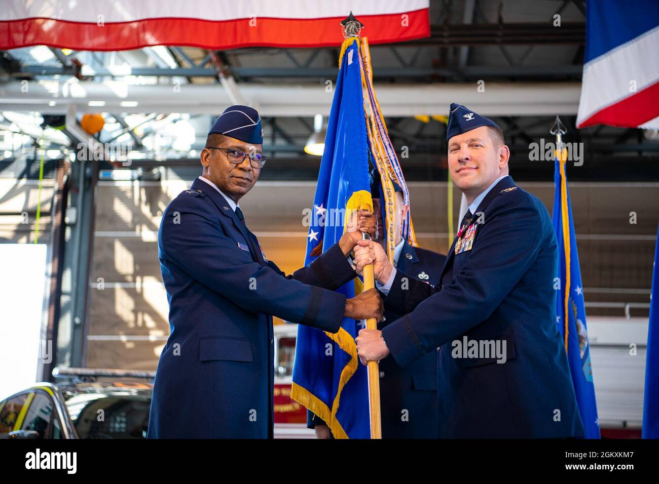 U.S. Air Force Maj. Gen. Randal Reed,left, Third Air Force commander,  presents a Legion of Merit decoration during a change of command ceremony  at RAF Alconbury, England, July 20, 2021. The Legion