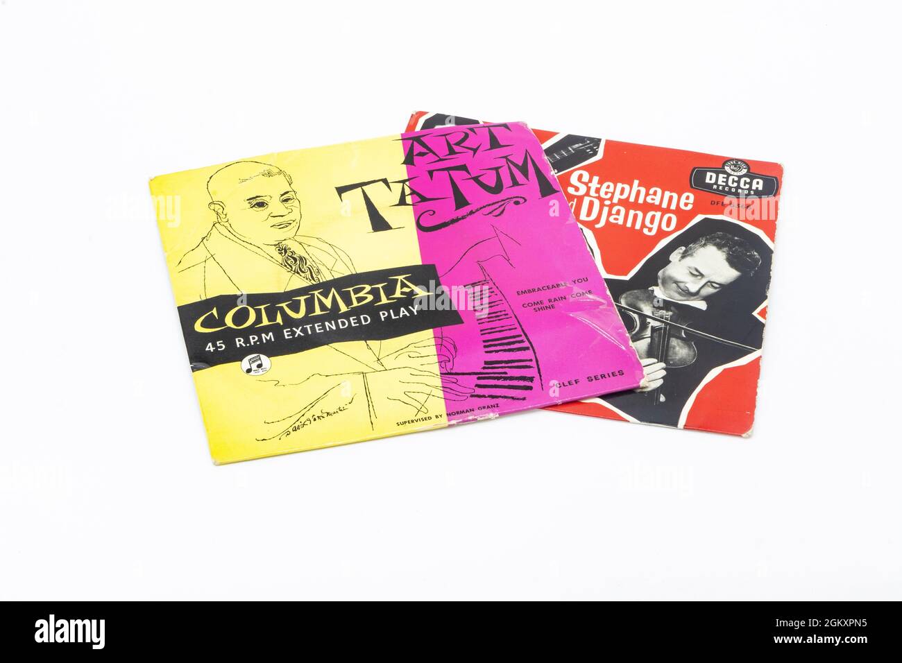 two seven inch vinyl 45rpm singles with picture sleeves from jazz musician art Tatum and Stephan grapellii and Django reinhart Stock Photo