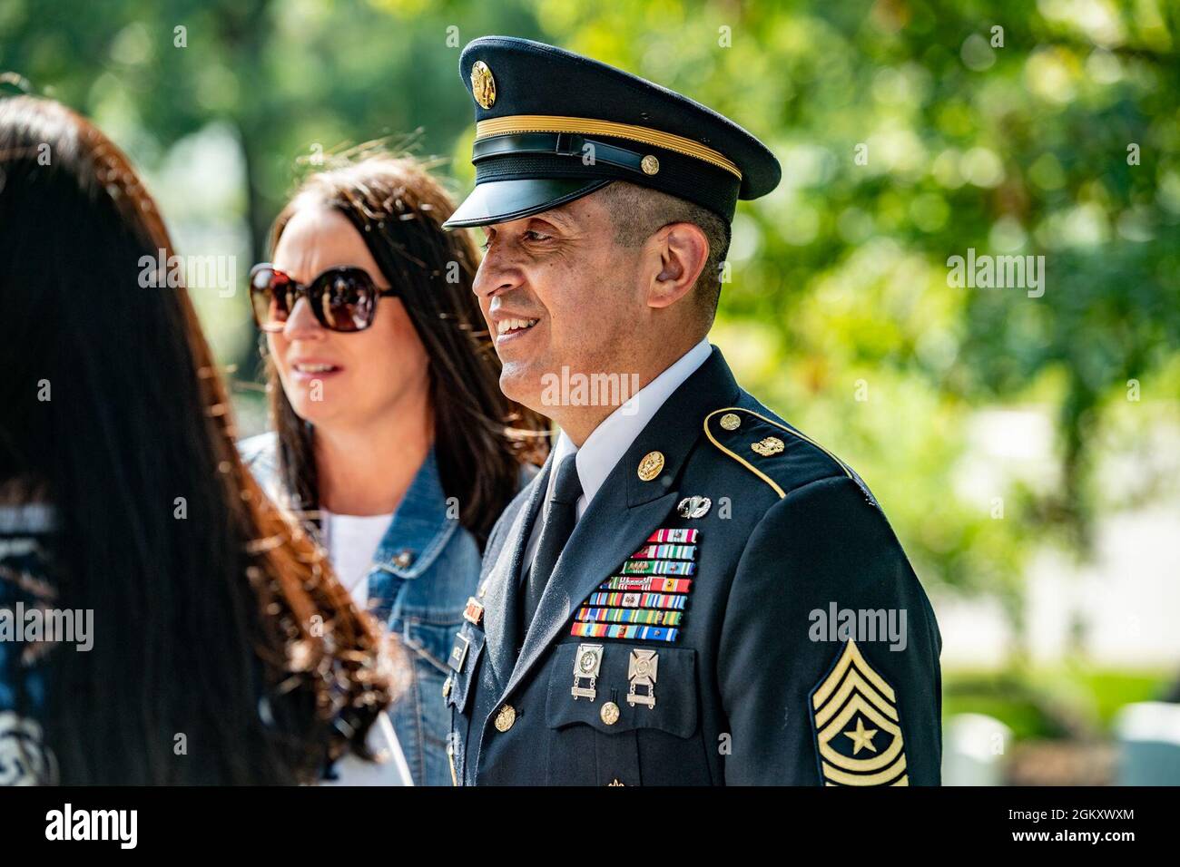 .S. Army Sgt. Maj. Ralph Martinez, 9th regimental sergeant major, U.S. Army Chaplain Corps attends a ceremony in honor of the 246th Chaplain Corps Anniversary at Chaplain's Hill in Section 2 of Arlington National Cemetery, Arlington, Virginia, July 22, 2021. Stock Photo