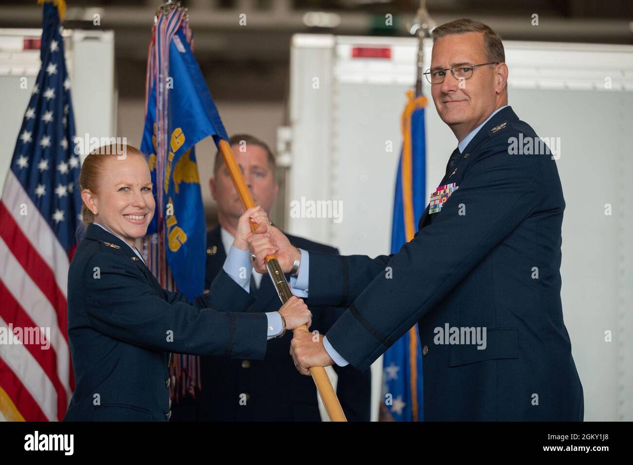 Col. Benton, right, accepts command of the 341st Maintenance