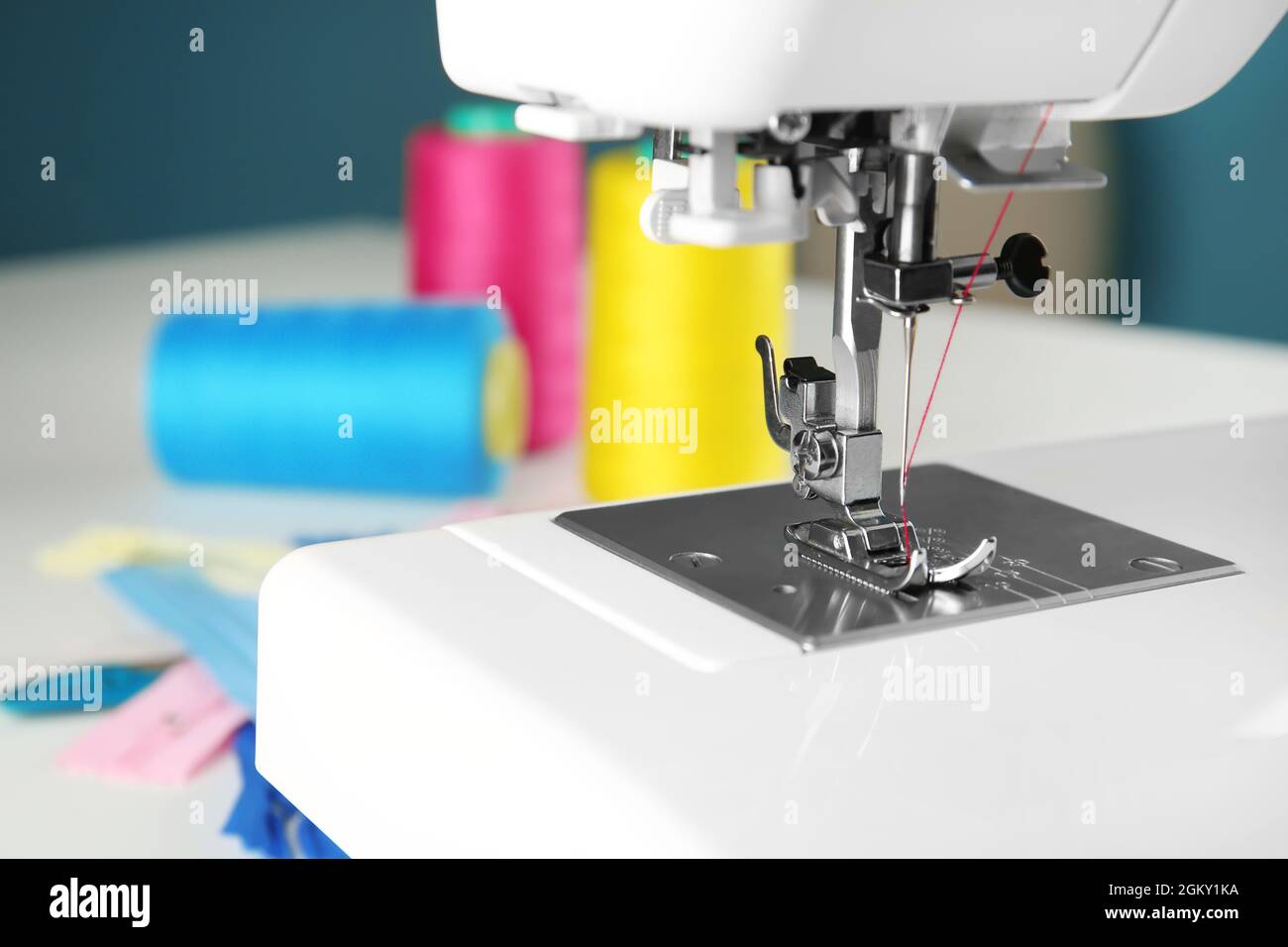 Sewing machine on table, closeup Stock Photo Alamy