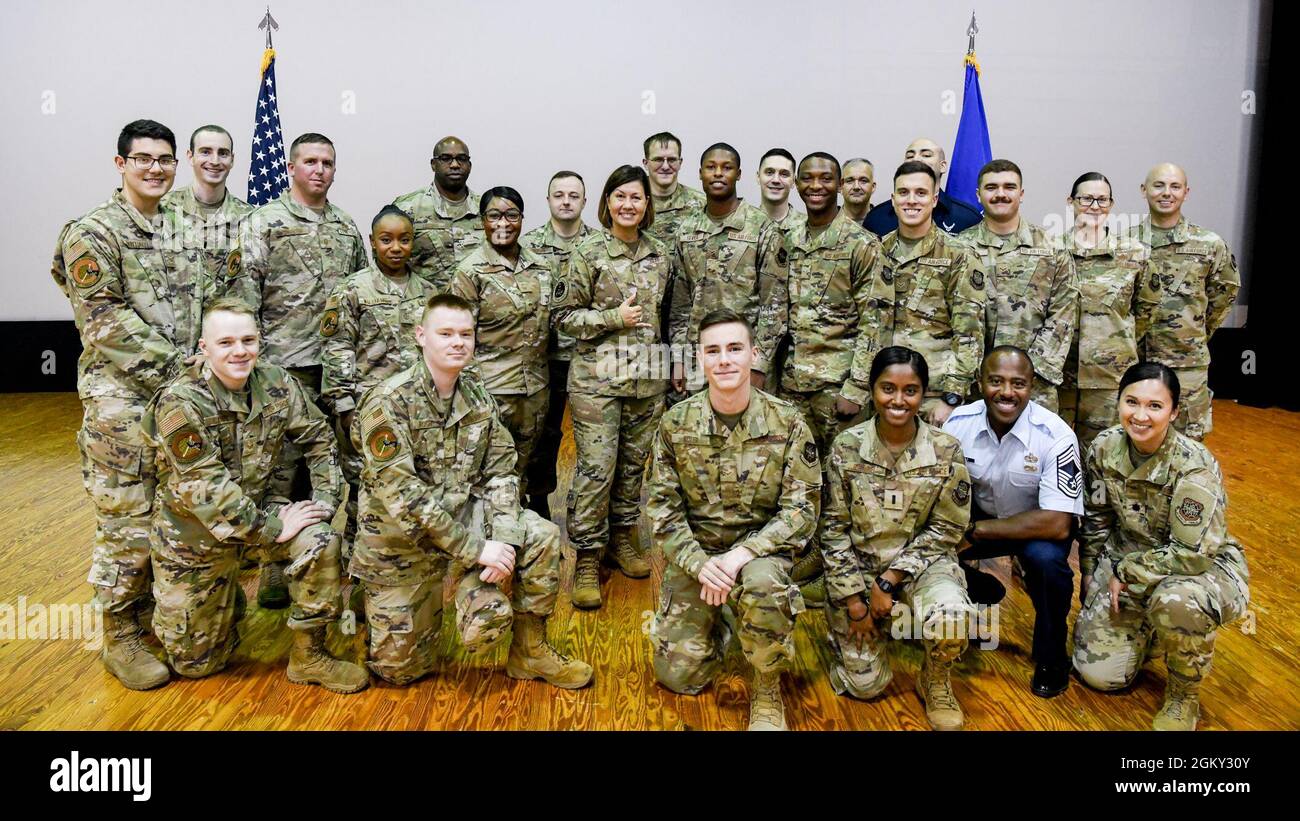 Chief Master Sgt. of the Air Force JoAnne S. Bass poses for a photo with 89th Airlift Wing Airmen at the base theatre on Joint Base Andrews, M.D., July 23, 2021. Bass visited the 89th AW to help familiarize her with the mission and operations of the 89th AW. Stock Photo