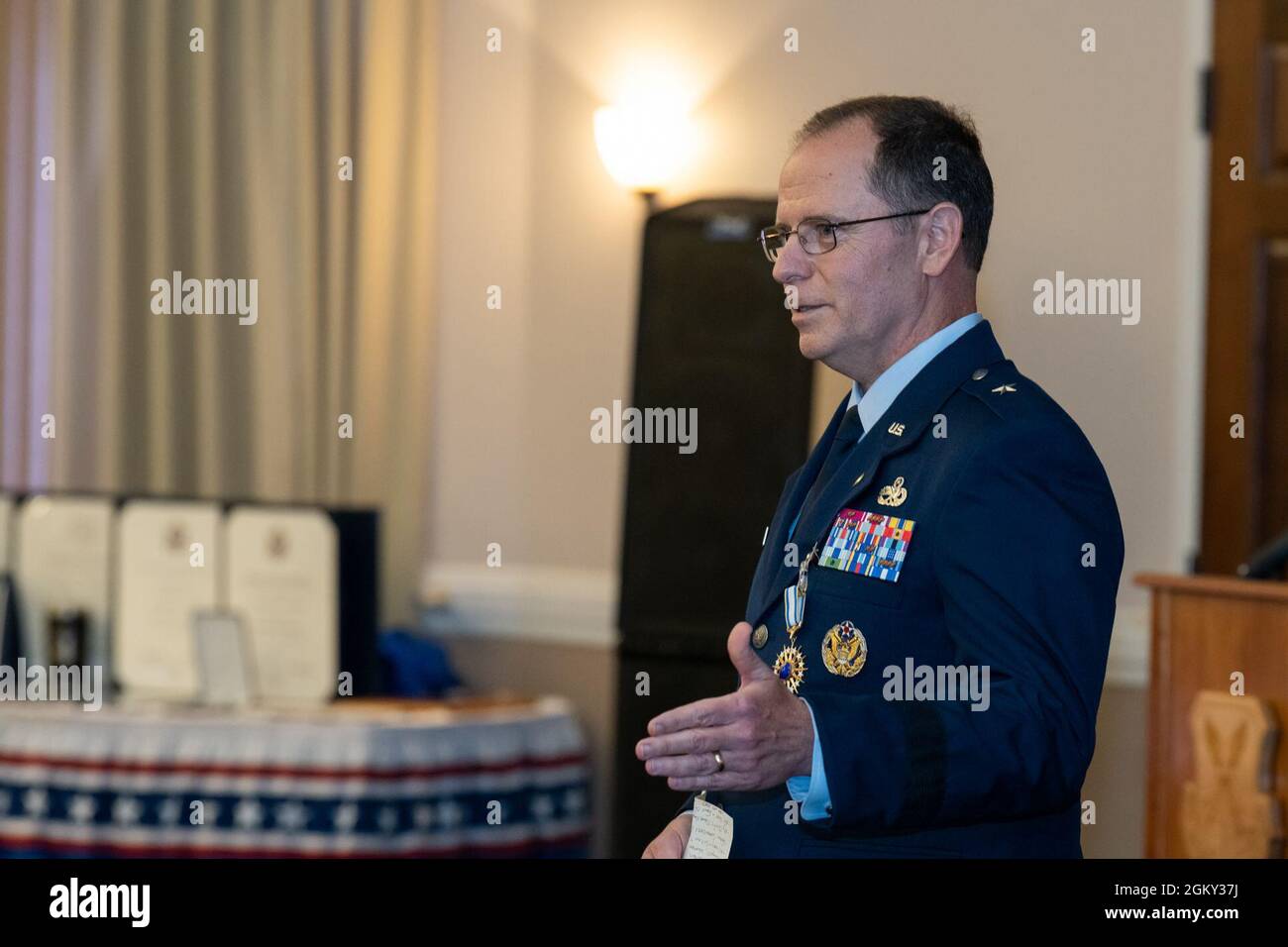 Brig. Gen. Eric Froehlich, Air Force Global Strike Command director of logistics and engineering, makes remarks during his retirement ceremony at Barksdale Air Force Base, Louisiana, July 23, 2021. Froehlich served honorably in the Air Force for 29 years. Stock Photo