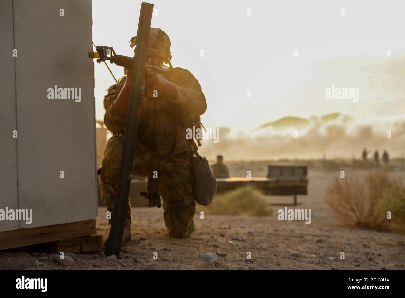 A Soldier with the 45th Infantry Brigade Combat Team, aims his weapon ...