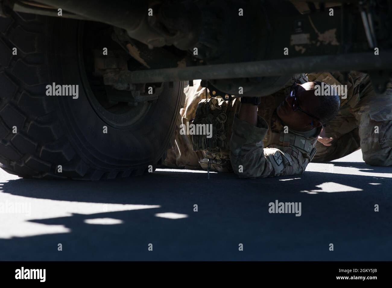 U.S. Army Soldiers prepare to load a High Mobility Artillery Rocket System onto a KC-130J Super Hercules with Marine Aerial Refueler Transport Squadron (VMGR) 152 in support of Exercise Talisman Sabre 21 from Whitsunday Coast Airport, Queensland, Australia, July 25, 2021. Australian and U.S. Forces combine biennially for Talisman Sabre, a month-long multi-domain exercise that strengthens allied and partner capabilities to respond to the full range of Indo-Pacific security concerns. Stock Photo