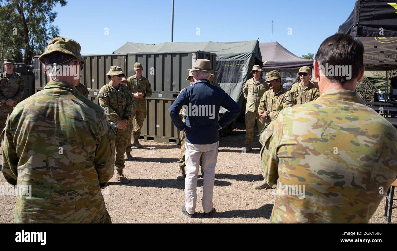 His Excellency the Honourable Paul de Jersey Companion of the Order of  Australia, Commander of the Royal Victorian Order, Governor of Queensland,  is greeted by Australian Army and U.S. Army Soldiers during