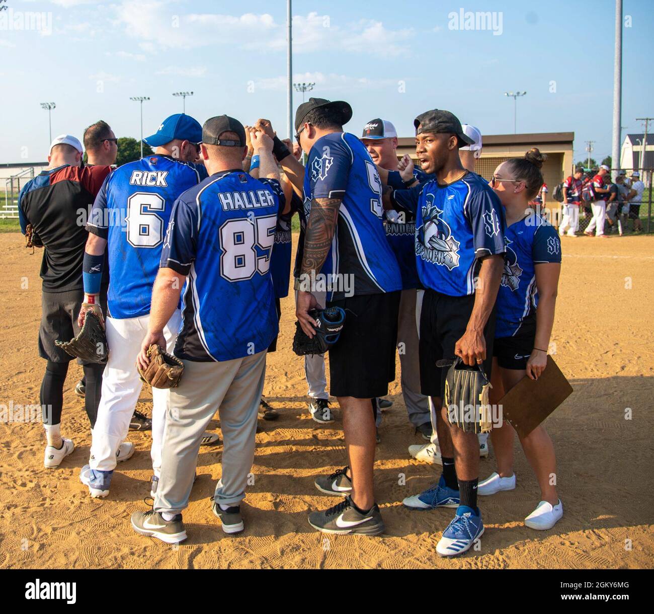 Airmen from the 436th Security Forces Squadron cheer after winning their intramural softball game on Dover Air Force Base, Delaware, July 26, 2021. The 436th SFS won the game 13-4. Stock Photo