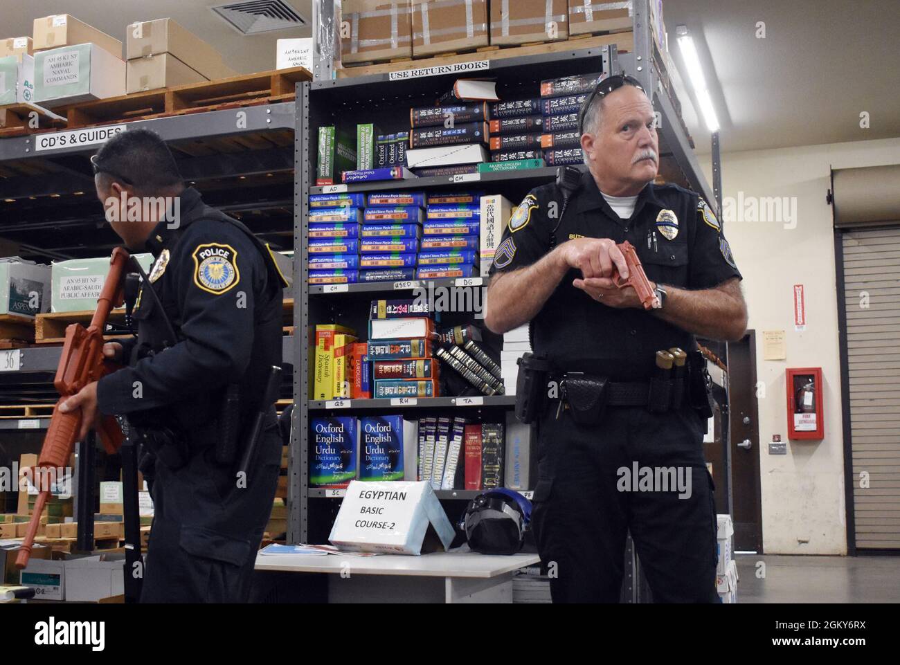 Sgt. John Butz of the Presidio of Monterey Police Department listens