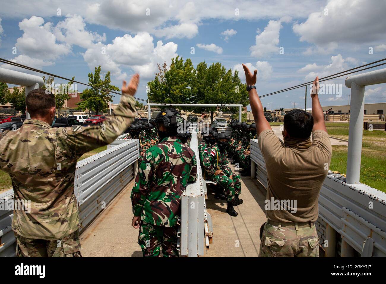 82nd Airborne Division Jumpmasters conduct Mock Door Training for Indonesian Paratroopers during the Basic Airborne Refresher course on Fort Bragg, N.C. on July 27, 2021. Stock Photo