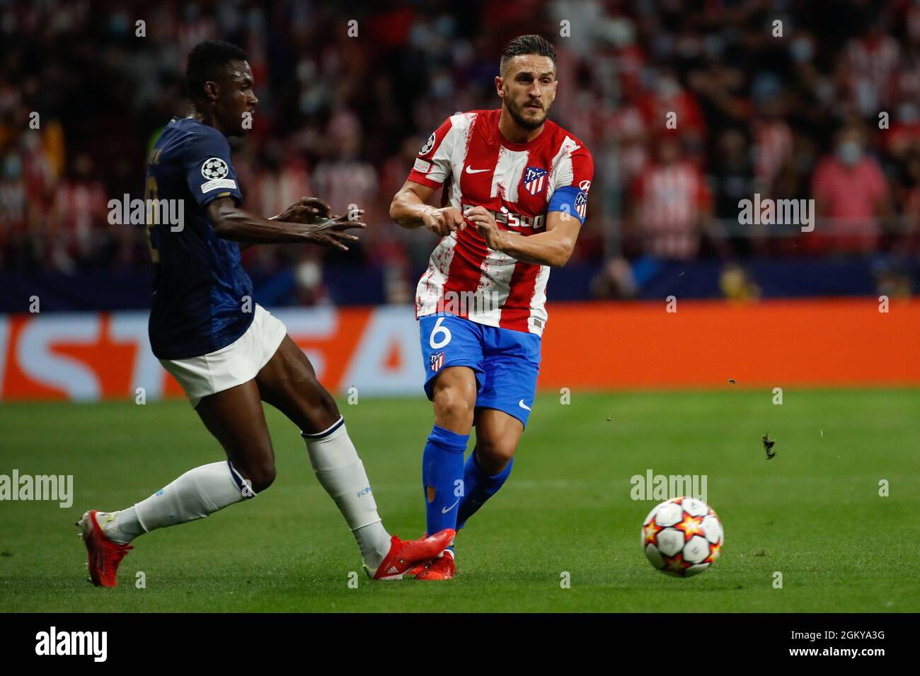 Madrid, Spain. 15th Sep 2021. Koke of Atletico de Madrid in action with Zaidu of FC Porto during the UEFA Champions League match between Atletico de Madrid and FC Porto at Wanda Metropolitano in Madrid, Spain. Credit: DAX Images/Alamy Live News Stock Photo