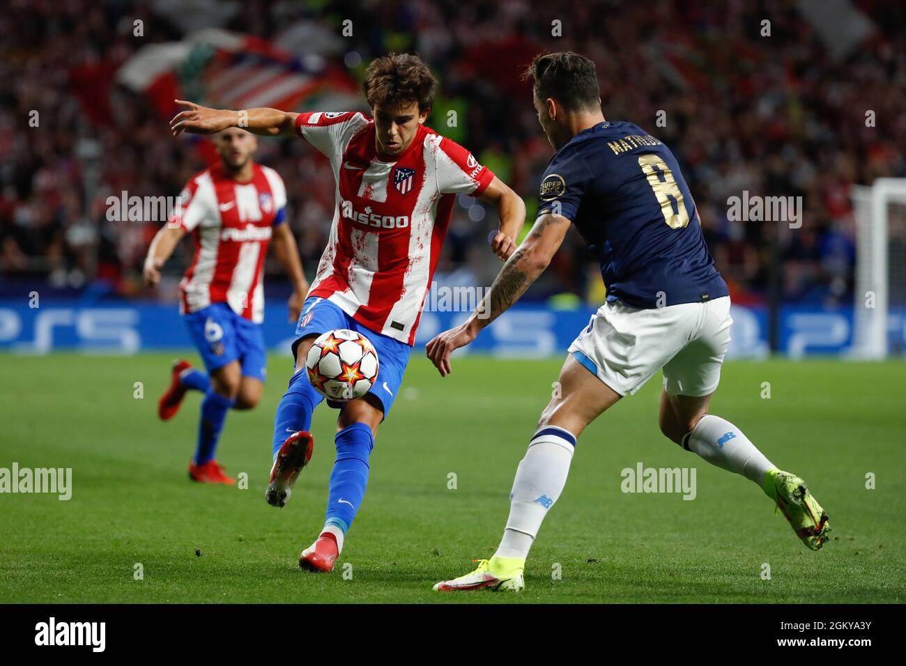 Madrid, Spain. 15th Sep 2021. Joao Felix of Atletico de Madrid in action with Mateus Uribe of FC Porto during the UEFA Champions League match between Atletico de Madrid and FC Porto at Wanda Metropolitano in Madrid, Spain. Credit: DAX Images/Alamy Live News Stock Photo