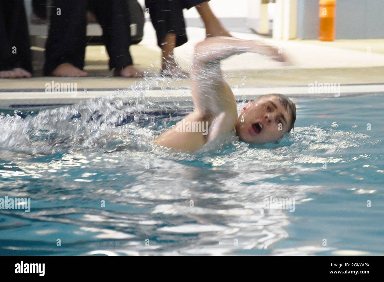 An Officer Development School (ODS) class 21070 student performs the freestyle stroke during his