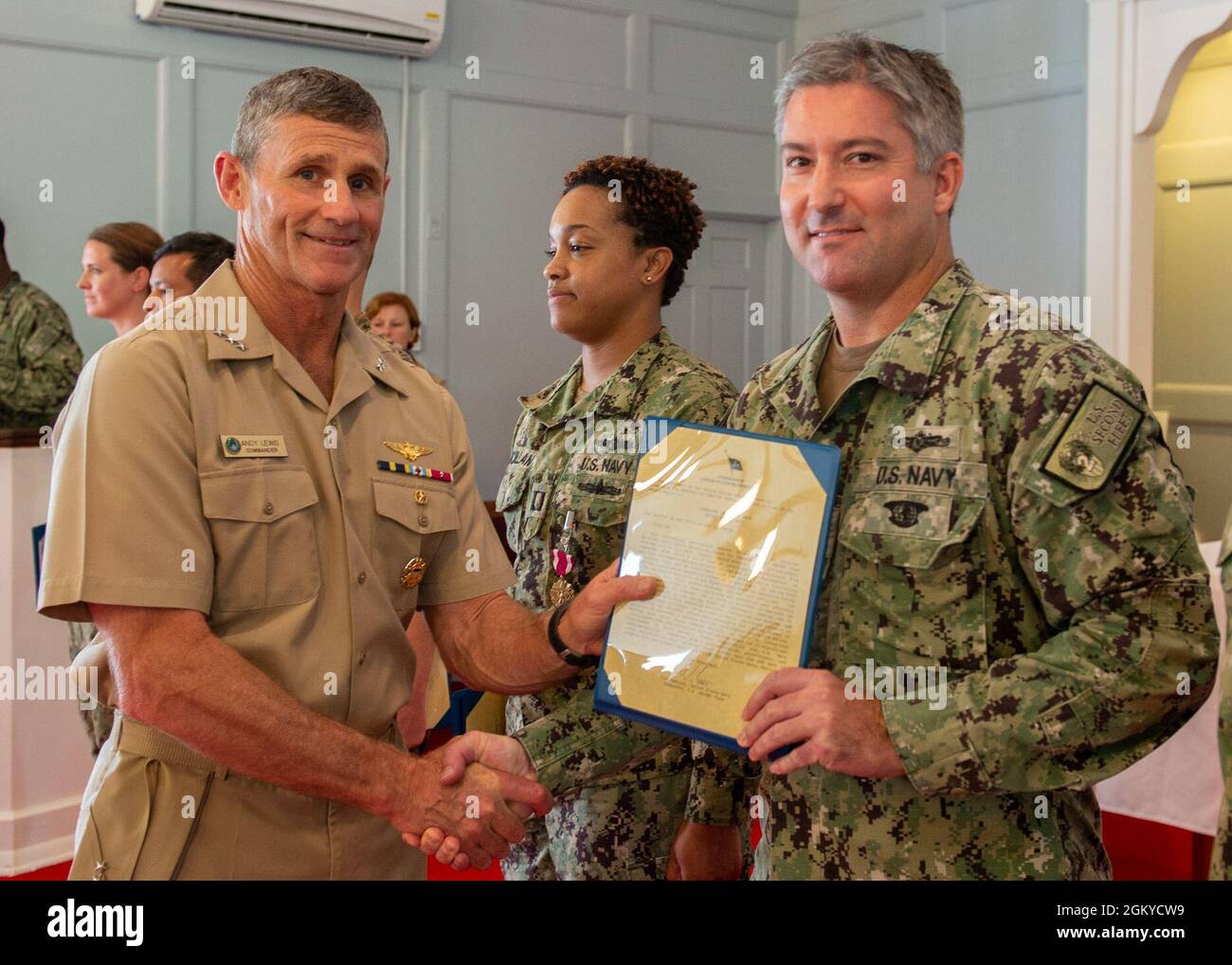 NORFOLK, Va. (July 28, 2021) Cmdr. Travis Bode receives a Meritorious ...