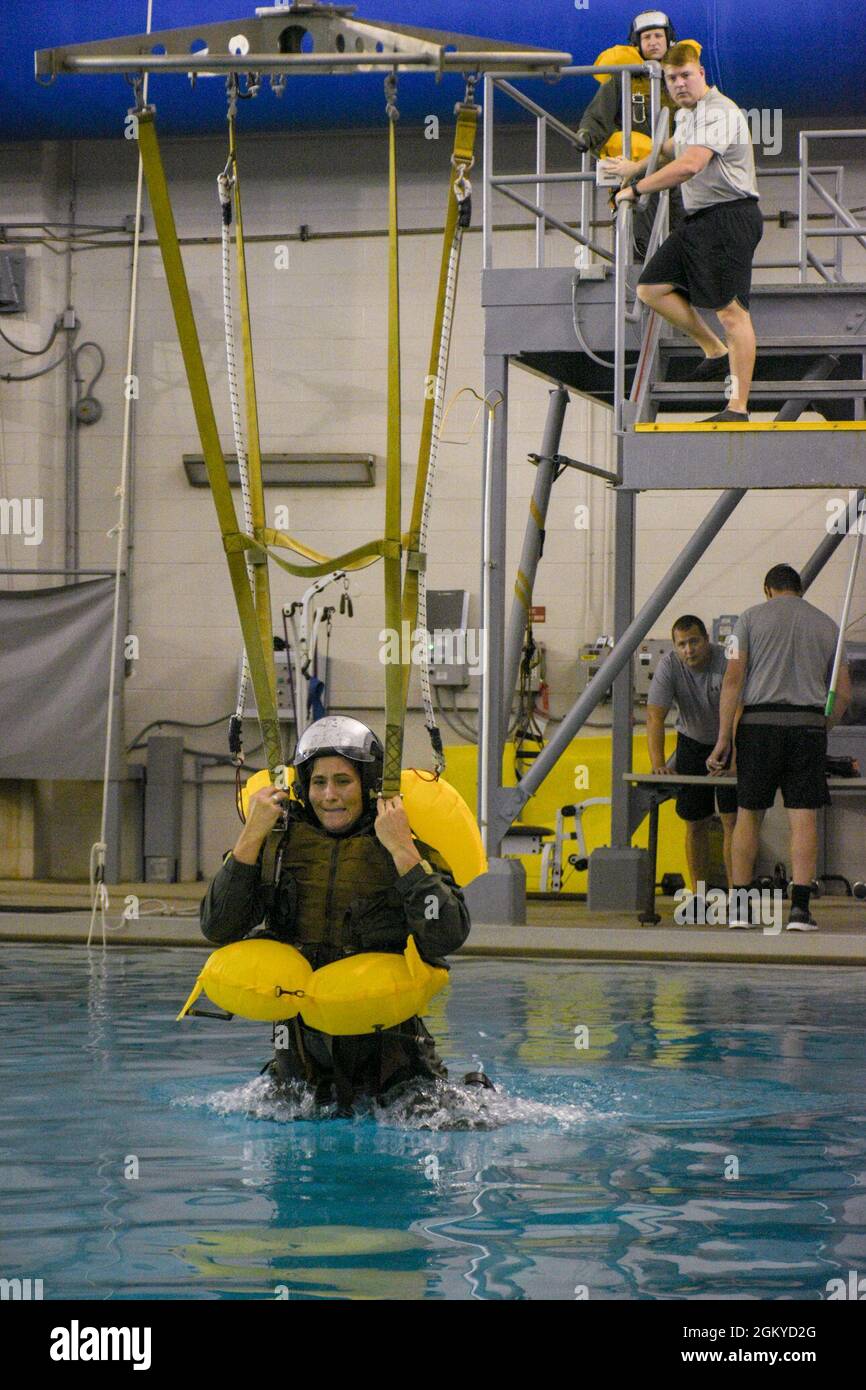 PENSACOLA, Fla. (July 27, 2021) A student at Aviation Survival Training Center (ASTC) Pensacola participates in water survival training. ASTCs all around the country deliver safe and effective high-risk survival and human performance training under the Naval Survival Training Institute (NSTI), a detachment of the Navy Medicine Operational Training Command (NMOTC). Stock Photo