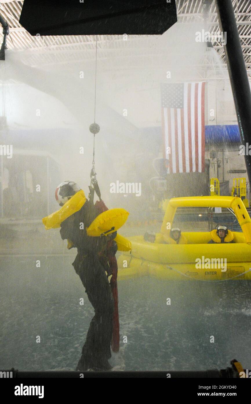 PENSACOLA, Fla. (July 27, 2021) A student at Aviation Survival Training Center (ASTC) Pensacola participates in water survival training. ASTCs all around the country deliver safe and effective high-risk survival and human performance training under the Naval Survival Training Institute (NSTI), a detachment of the Navy Medicine Operational Training Command (NMOTC). Stock Photo