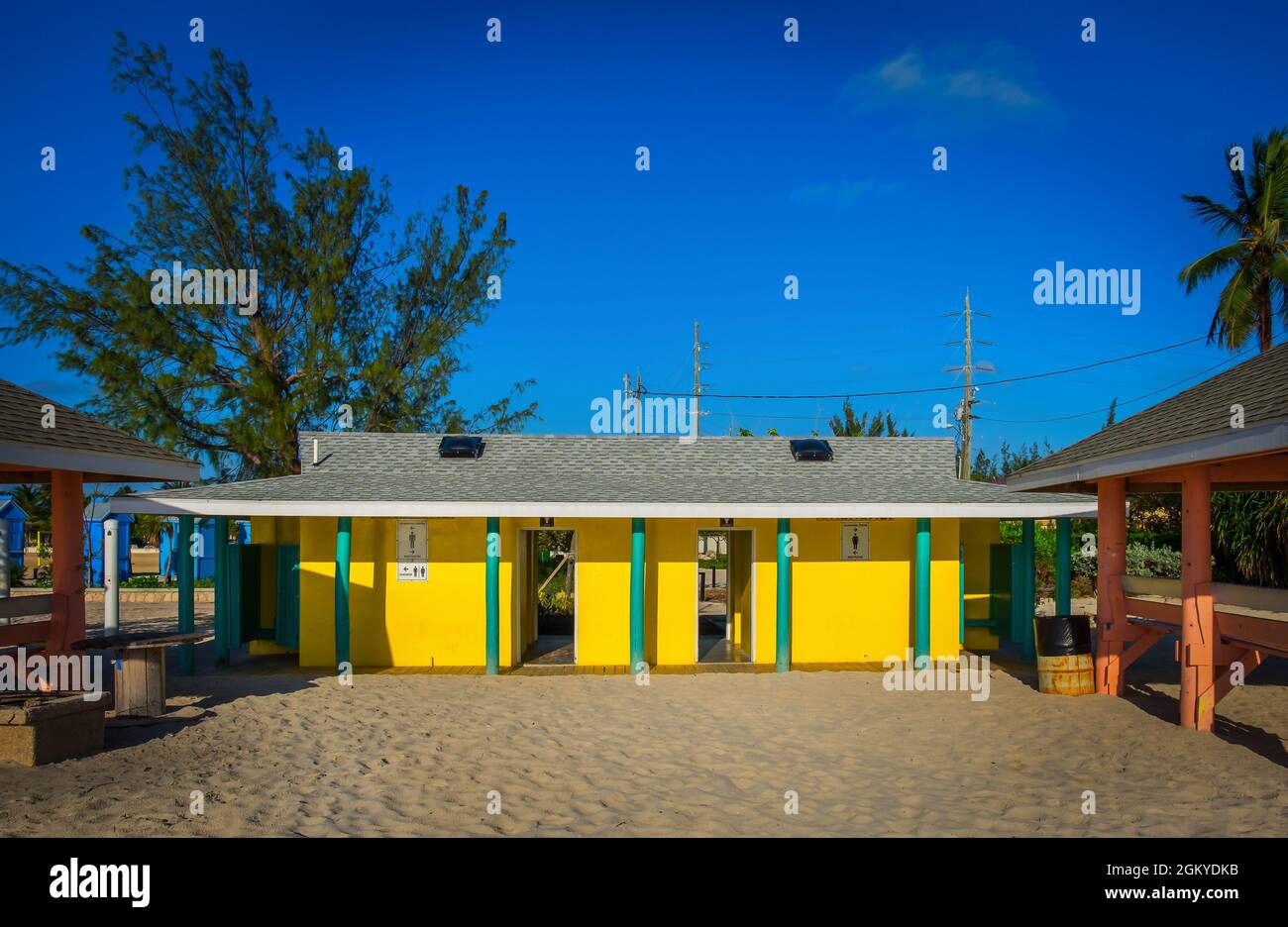 Grand Cayman, Cayman Islands, Feb 2021,Colourful public toilet building on Seven Mile Beach Stock Photo
