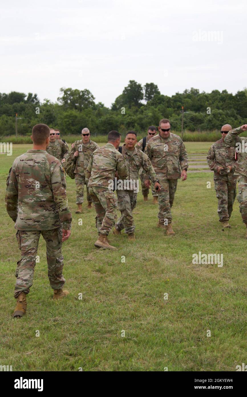 Lt. Gen. Antonio A. Aguto, commanding general of First Army (center), is greeted at North Fort Hood, Texas, by Lt. Col. Julian T. Kemper, executive officer of 120th Infantry Brigade, Division West - First Army, on July 28, 2021. Aguto visited North Fort Hood to observe current capabilities of the OC/T leadership, mobilization training grounds, and meet with OC/T NCOs from 120th Infantry Brigade and 166th Aviation Brigade, Division West - First Army. Stock Photo