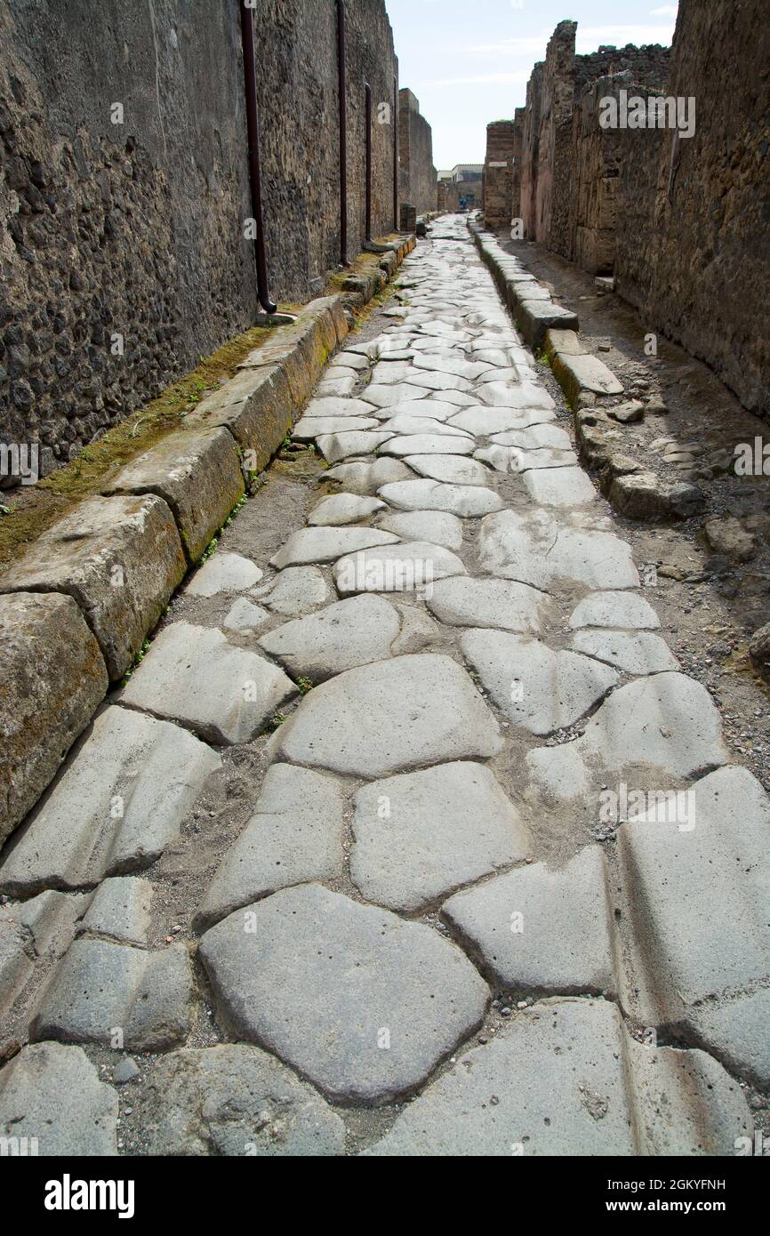 Ancient stone road at Pompei archeological site, Naples, Italy Stock Photo