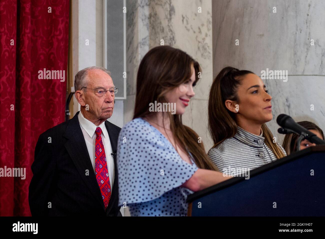 United States Senator Chuck Grassley (Republican of Iowa), left, listens as Former U.S. Olympic gymnast McKayla Maroney, center, and Former U.S. Olympic gymnast Aly Raisman, right, offer remarks during a press conference to talk about the abuse that they and other women gymnasts experienced from Larry Nassar, the now-incarcerated U.S. women's national gymnastics team doctor, and the FBI's handling of their cases, in the Russell Senate Office Building in Washington, DC, Wednesday, September 15, 2021. Credit: Rod Lamkey/CNP/Sipa USA Stock Photo