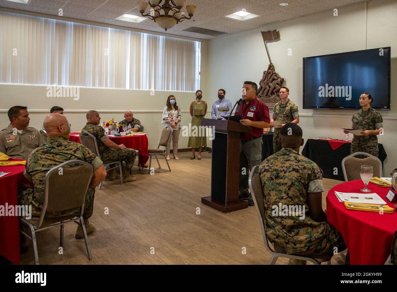 Daniel Mintz Sr., Mayor of the City of Twentynine Palms, speaks to guests during a Servicemembers of the Quarter Honoree Luncheon at Marine Corps Air Ground Combat Center, Twentynine Palms, California, July 29, 2021. The event was hosted by the Armed Services Young Men’s Christian Association Twentynine Palms to congratulate the honorees on their outstanding service over the spring quarter. Stock Photo