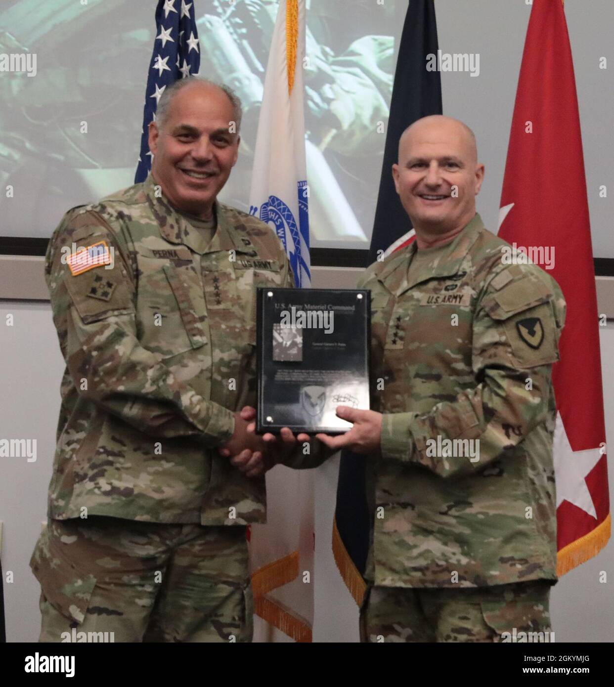 Army Materiel Command commander Gen. Ed Daly inducts retiring Gen. Gus Perna into the AMC Hall of Fame during the Army Sustainment Leader Summit at AMC Headquarters, Redstone Arsenal, Ala., July 30. Stock Photo