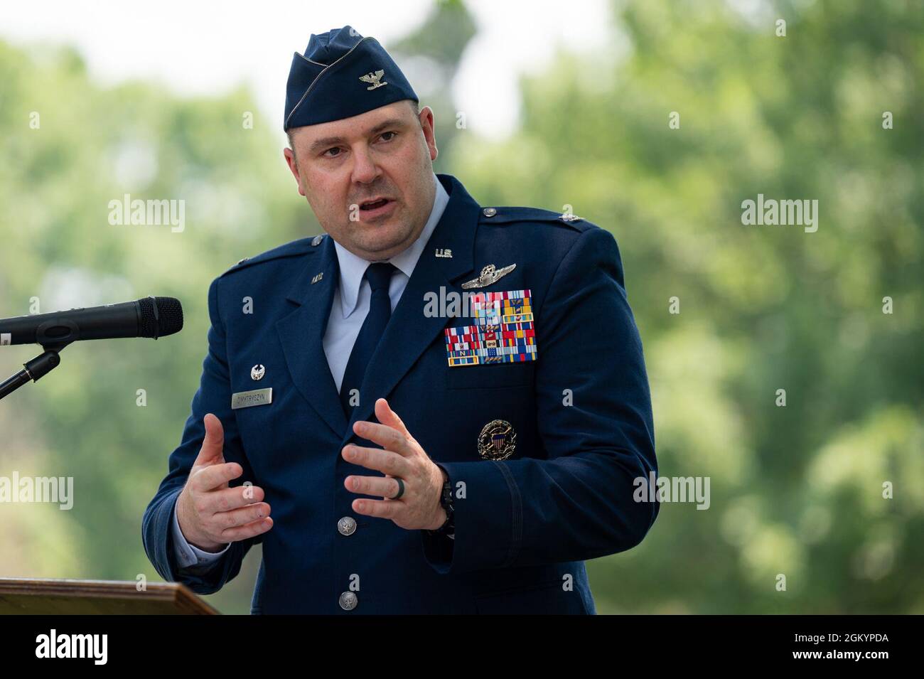 Col. Mark Dmytryszyn, 2nd Bomb Wing commander, gives his remarks during the Purser Park Monument unveiling ceremony at Barksdale Air Force Base, Louisiana, July 30, 2021. The monument was memorialized in front of Commander's Square park. Stock Photo