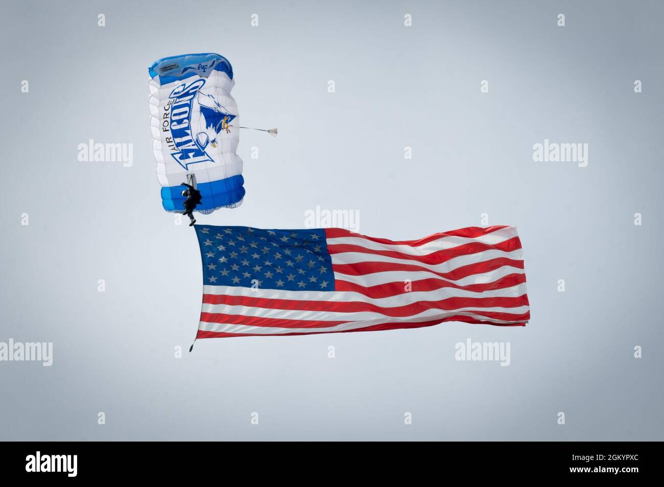 A U.S. Air Force Academy Wings of Blue parajumper glides while trailing